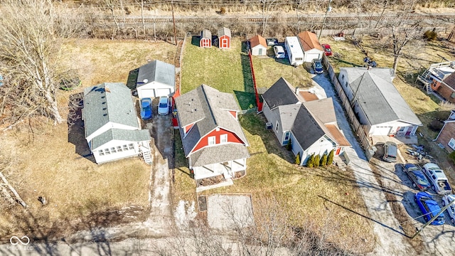 birds eye view of property with a residential view