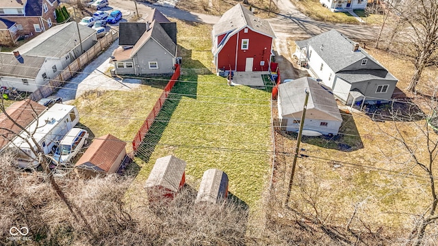 birds eye view of property with a residential view