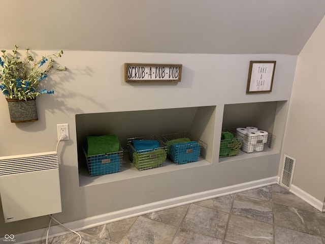 room details featuring visible vents and baseboards