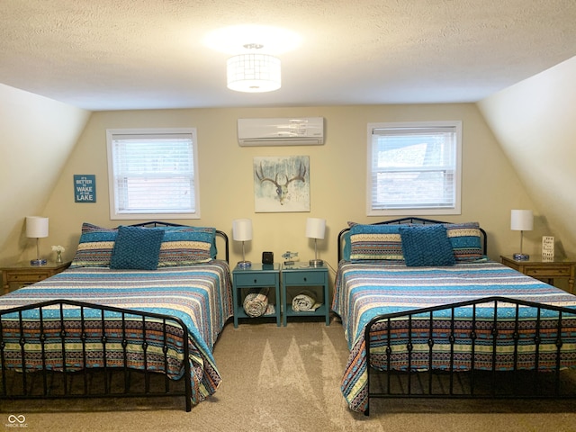 bedroom featuring vaulted ceiling, a textured ceiling, a wall mounted AC, and carpet floors