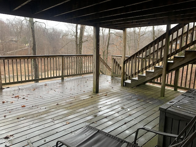 deck featuring stairway