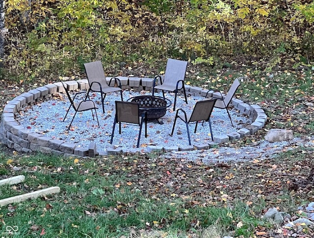 view of patio featuring an outdoor fire pit