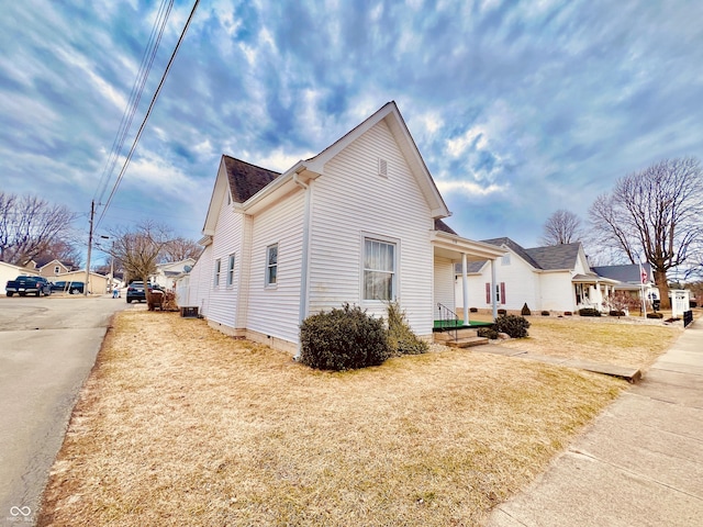 view of side of property featuring crawl space