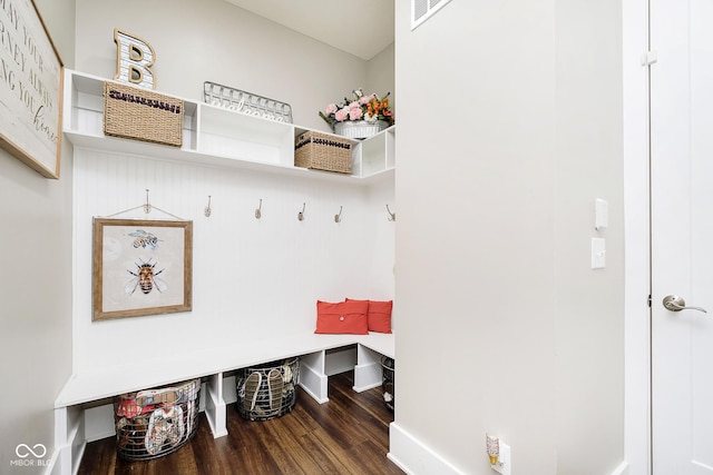 mudroom featuring visible vents, wood finished floors, and baseboards