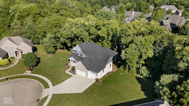 bird's eye view featuring a view of trees