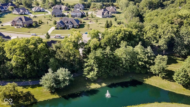 birds eye view of property with a residential view and a water view