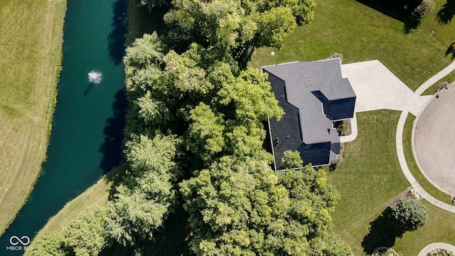 drone / aerial view with a water view