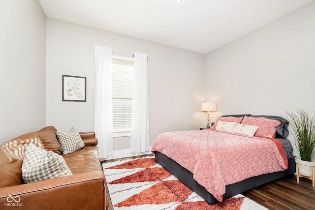 bedroom with wood finished floors