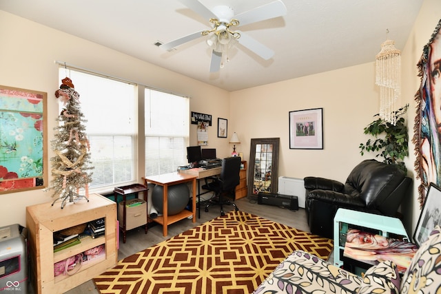 office space with wood finished floors and a ceiling fan