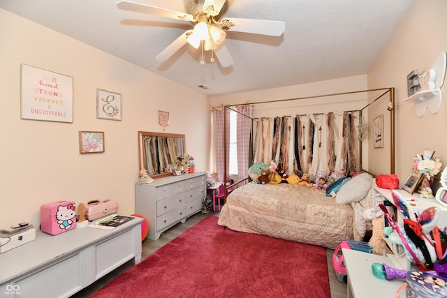 carpeted bedroom with a ceiling fan