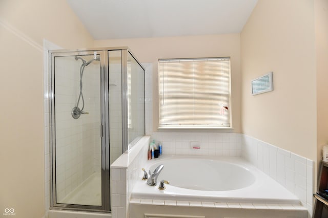 full bath with a garden tub and a shower stall