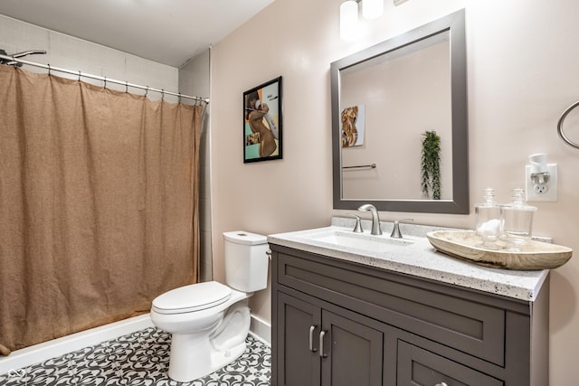 full bath with curtained shower, vanity, toilet, and baseboards