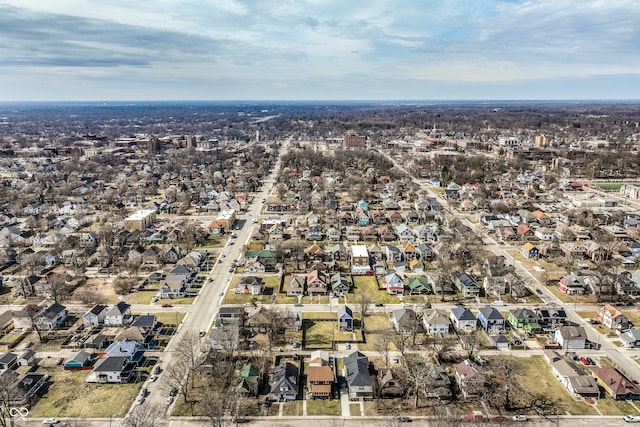 birds eye view of property with a residential view