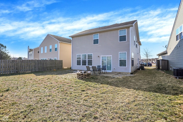 back of property featuring central air condition unit, fence, a patio, and a yard