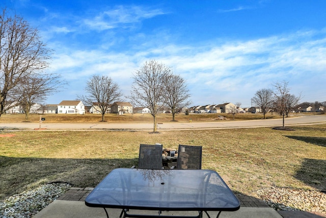 view of yard featuring a residential view