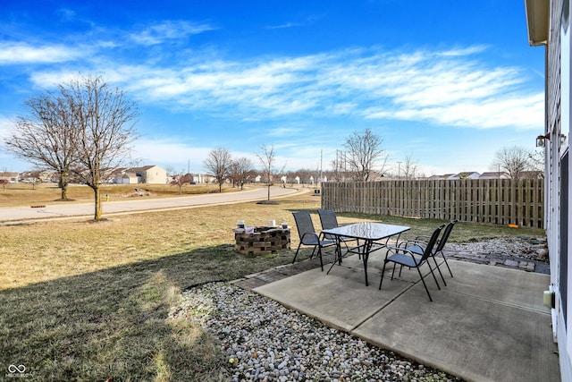 view of patio featuring fence and outdoor dining area