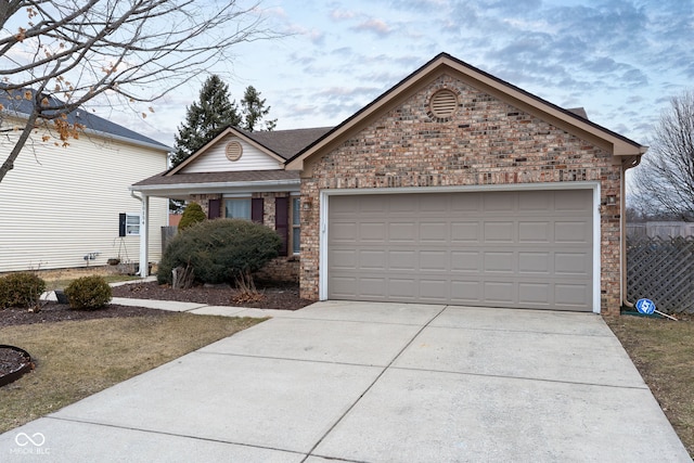 ranch-style home featuring a garage, concrete driveway, brick siding, and roof with shingles