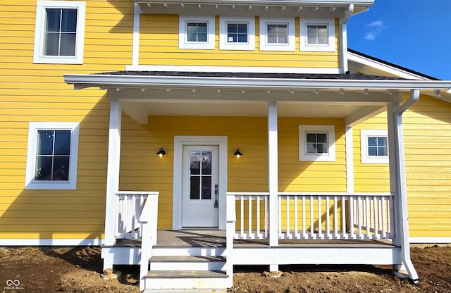 entrance to property with covered porch