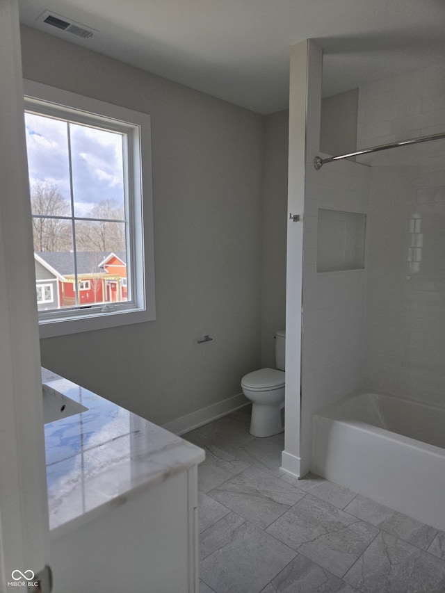 bathroom with visible vents, baseboards, marble finish floor, toilet, and vanity