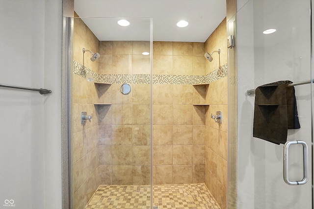 bathroom featuring a shower stall and recessed lighting