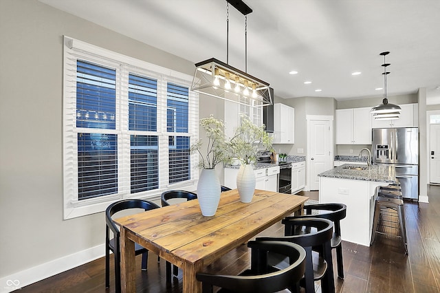 dining room featuring recessed lighting, baseboards, and dark wood-style flooring