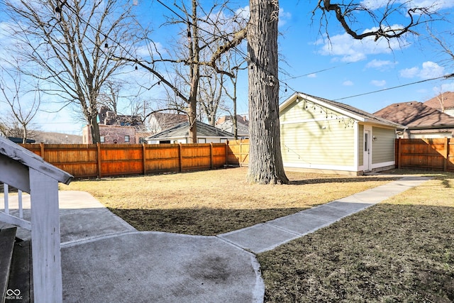 view of yard with a fenced backyard