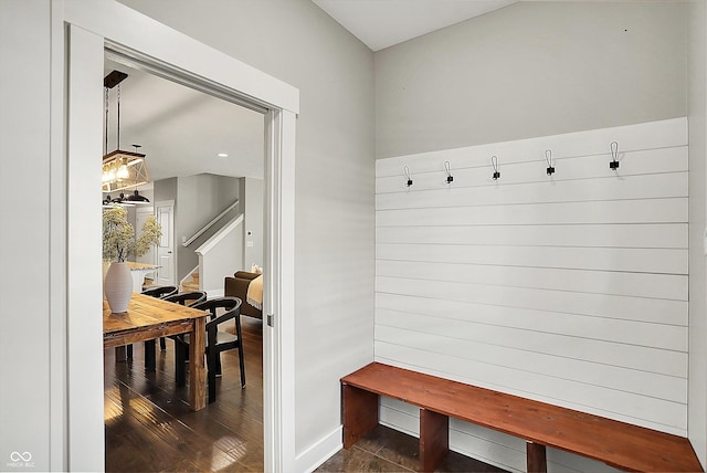 mudroom with baseboards and dark wood-style flooring