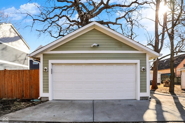 detached garage with fence