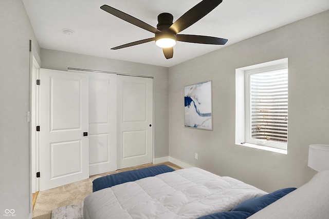 bedroom featuring a closet and ceiling fan