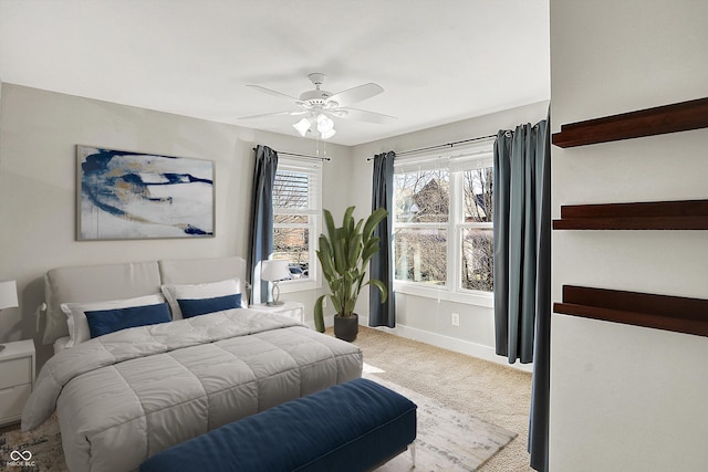 bedroom featuring baseboards, carpet, and ceiling fan