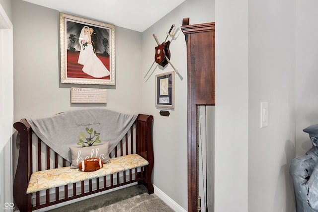 bedroom with carpet and baseboards