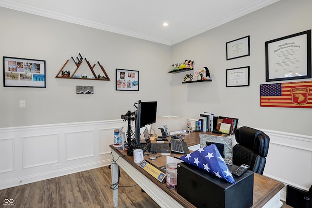 office featuring a wainscoted wall, crown molding, wood finished floors, and recessed lighting