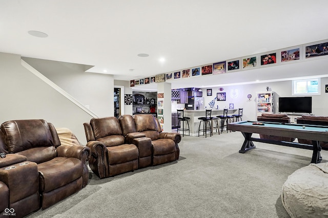 carpeted living area featuring billiards and a dry bar