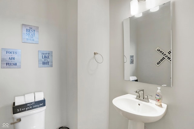 bathroom with a sink and toilet