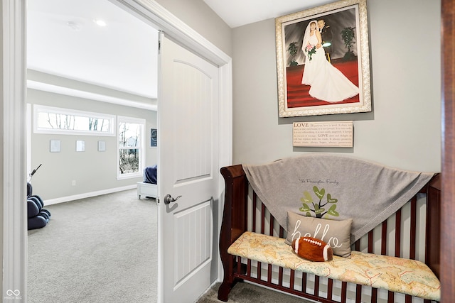 sitting room with carpet flooring and baseboards