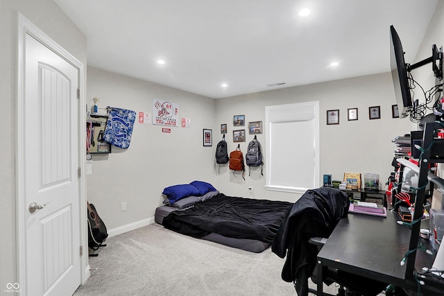 carpeted bedroom with baseboards, visible vents, and recessed lighting