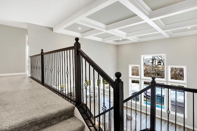 staircase with baseboards, coffered ceiling, and beamed ceiling