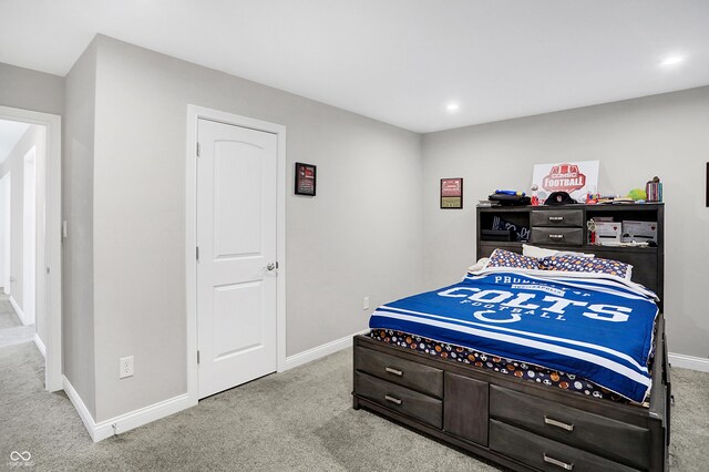 bedroom with carpet floors, baseboards, and recessed lighting