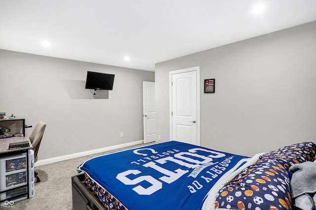 bedroom featuring baseboards and carpet flooring