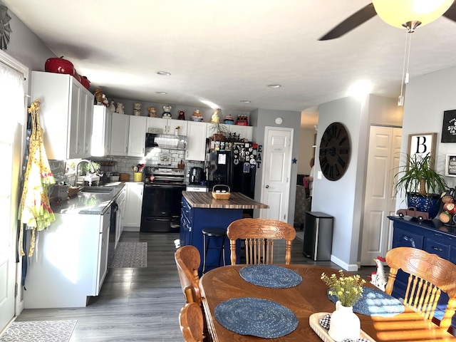 dining room featuring dark wood-style floors