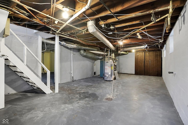 unfinished basement with water heater