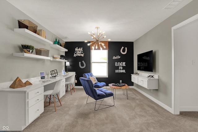 home office with baseboards, visible vents, built in study area, light colored carpet, and a chandelier