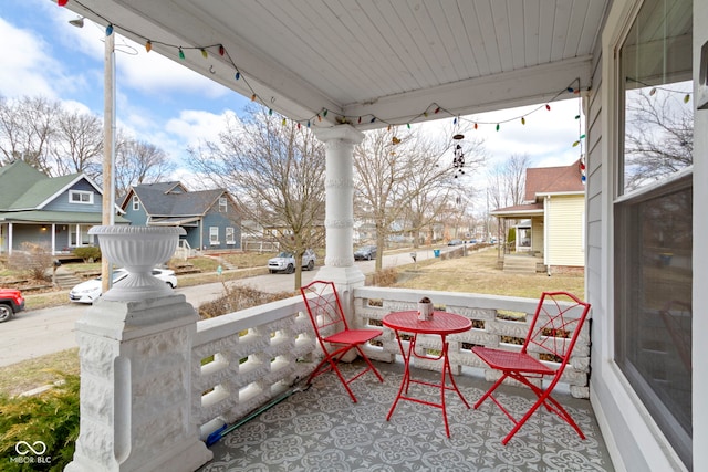 view of patio with a porch and a residential view