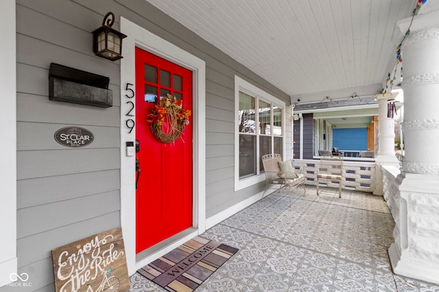 entrance to property with a porch