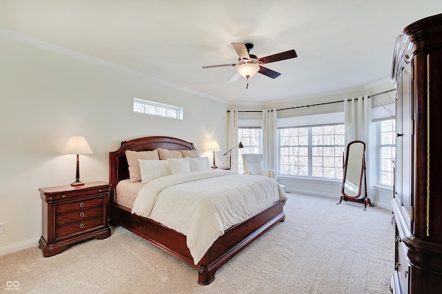 bedroom with baseboards, light colored carpet, and ornamental molding