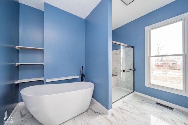 bathroom with marble finish floor, visible vents, and baseboards