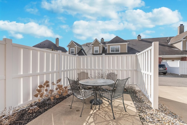 view of patio / terrace with outdoor dining area and a fenced backyard