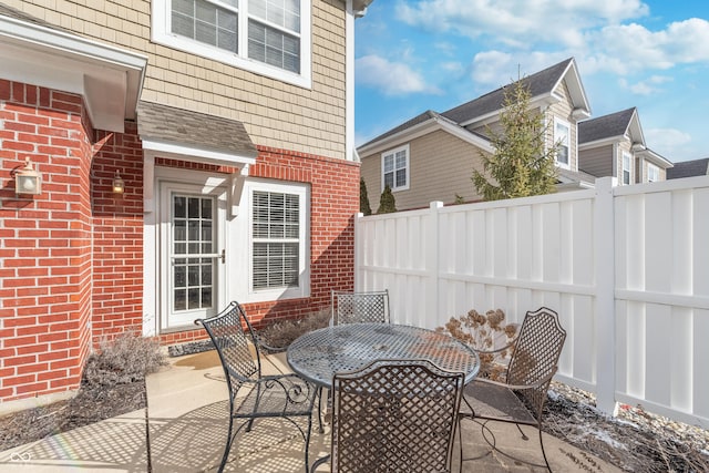 view of patio / terrace with fence and outdoor dining space