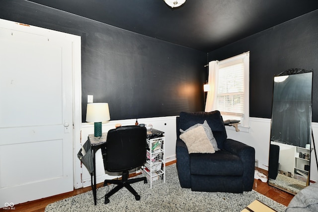 home office with wood finished floors