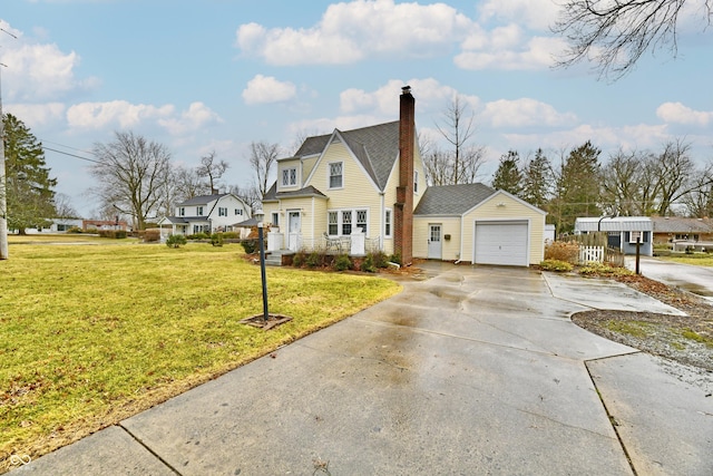 view of front of home with an attached garage, concrete driveway, a chimney, and a front yard